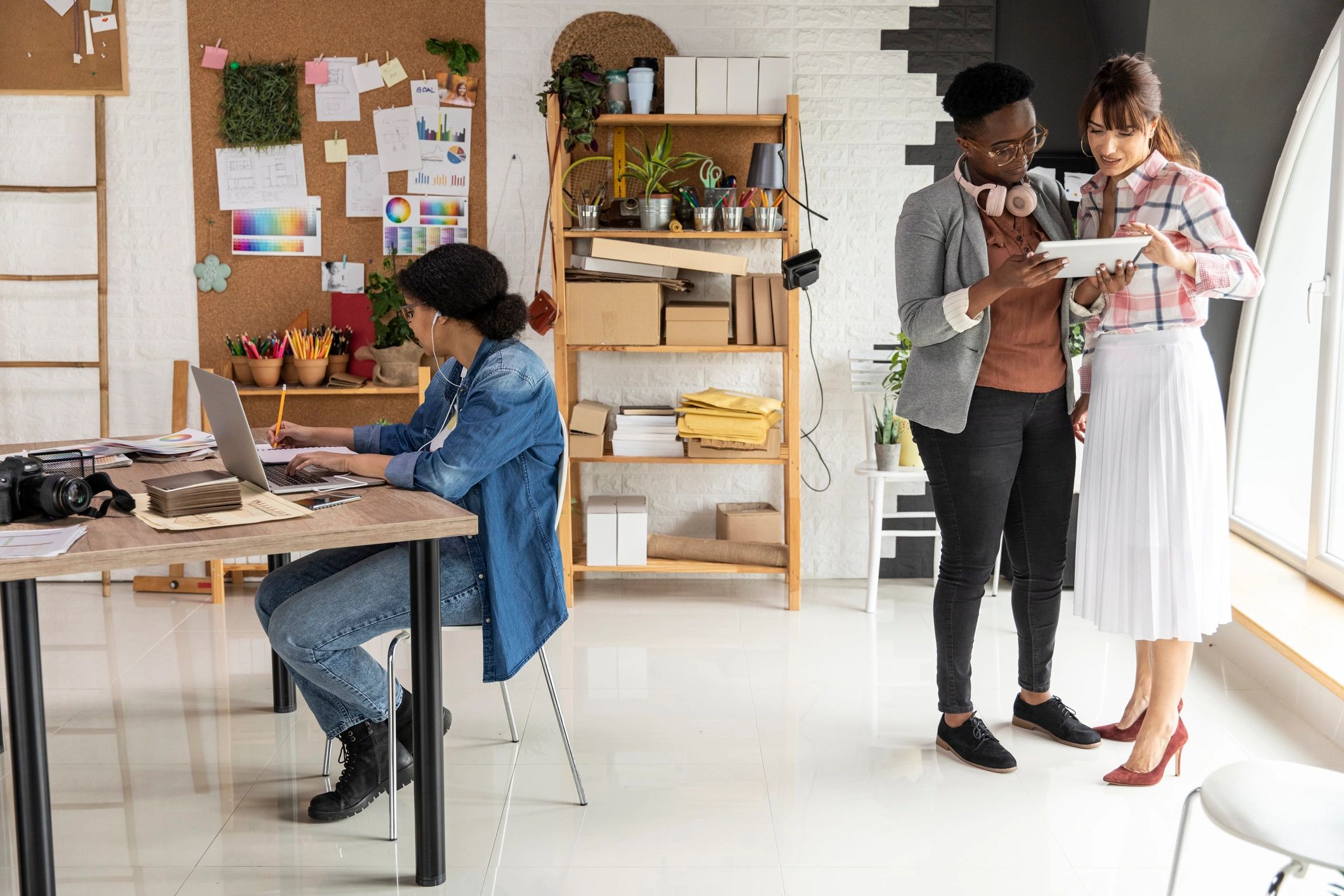 Creative professionals collaborating in a graphic design studio