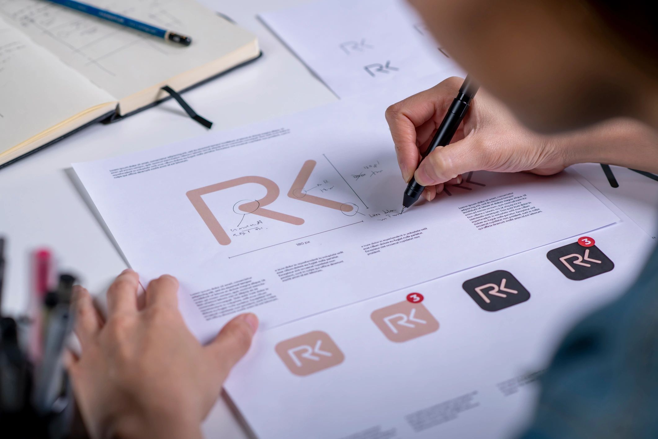 Designer sketching a logo concept