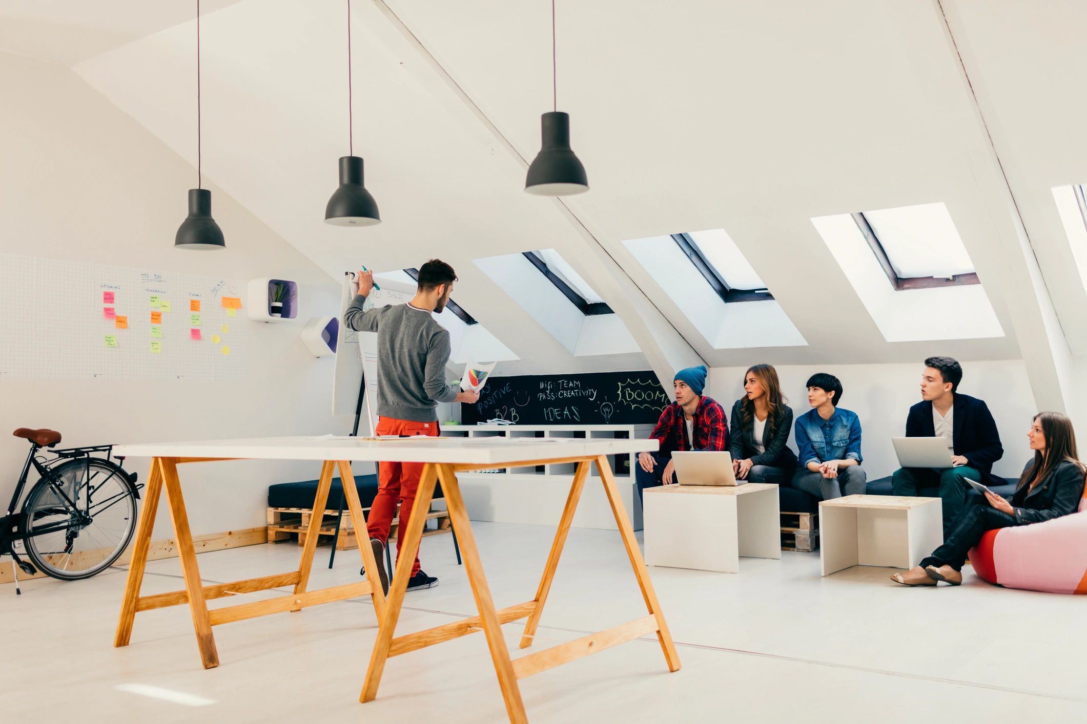 Creative team presenting ideas in a modern studio